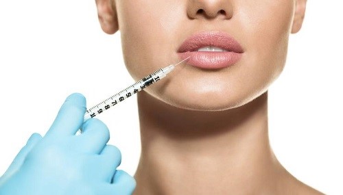 Botox and dermal filler injectables for wrinkle reduction and facial rejuvenation